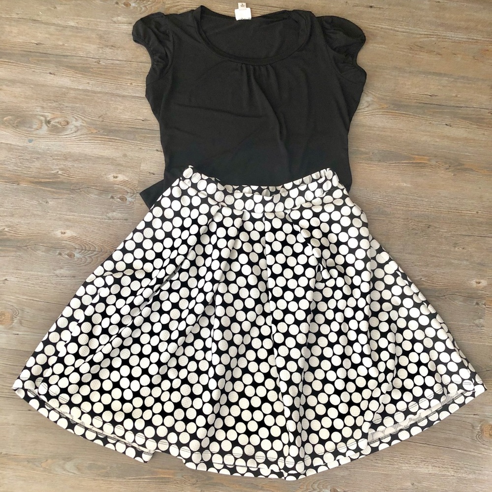 Charming Le Lis black with white polka dot skirt.